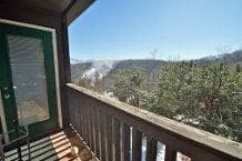 Balcony that is accessible from the living room or master bedroom with views of the mountains and ski slopes.